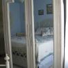 Blue bed through mirror